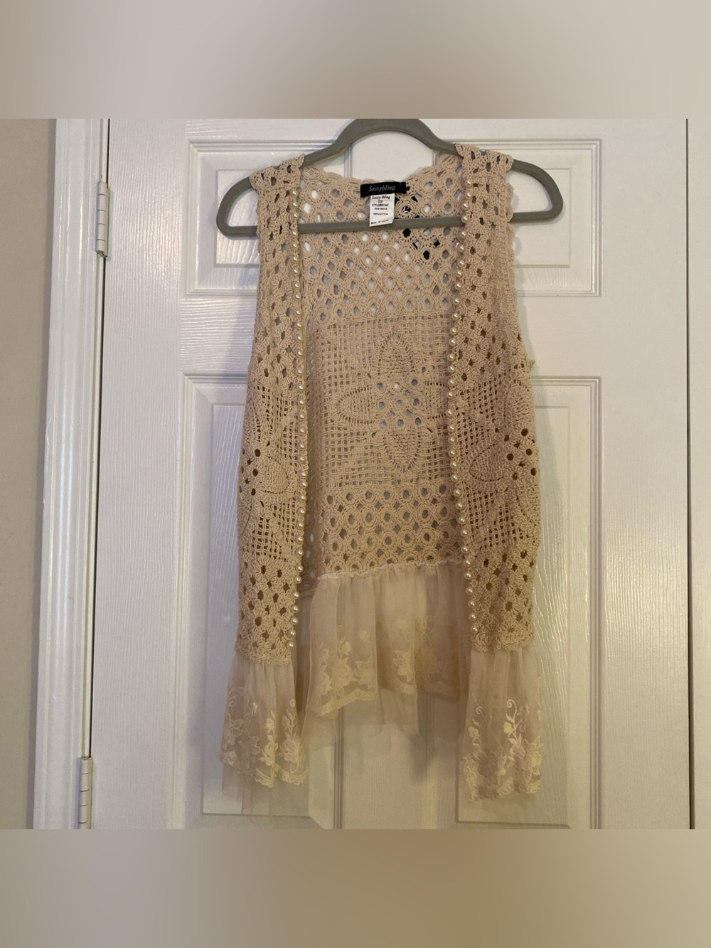 Crochet vest with lace and pearl accent